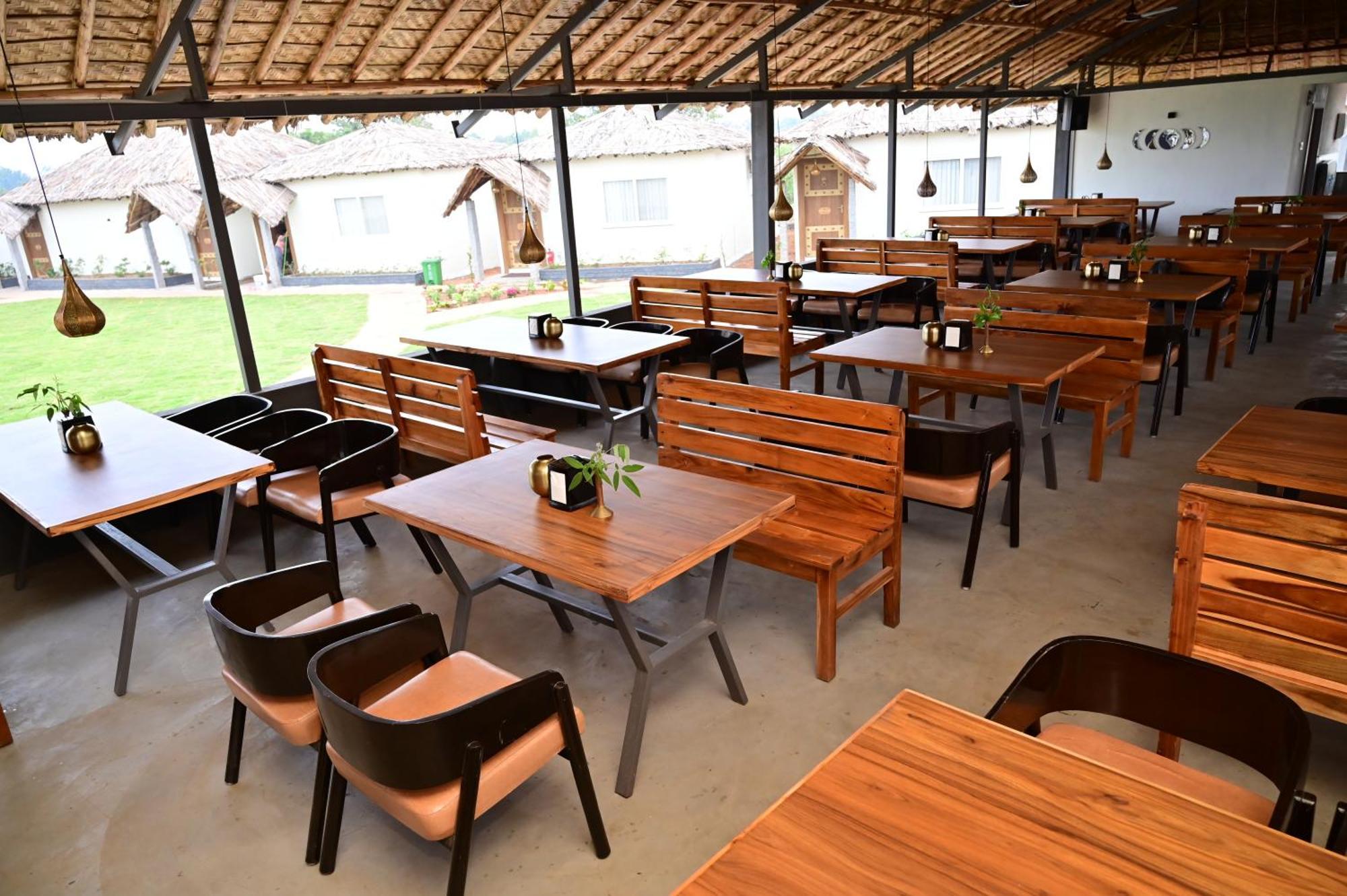 The Hampi Cafe Hotel Exterior photo