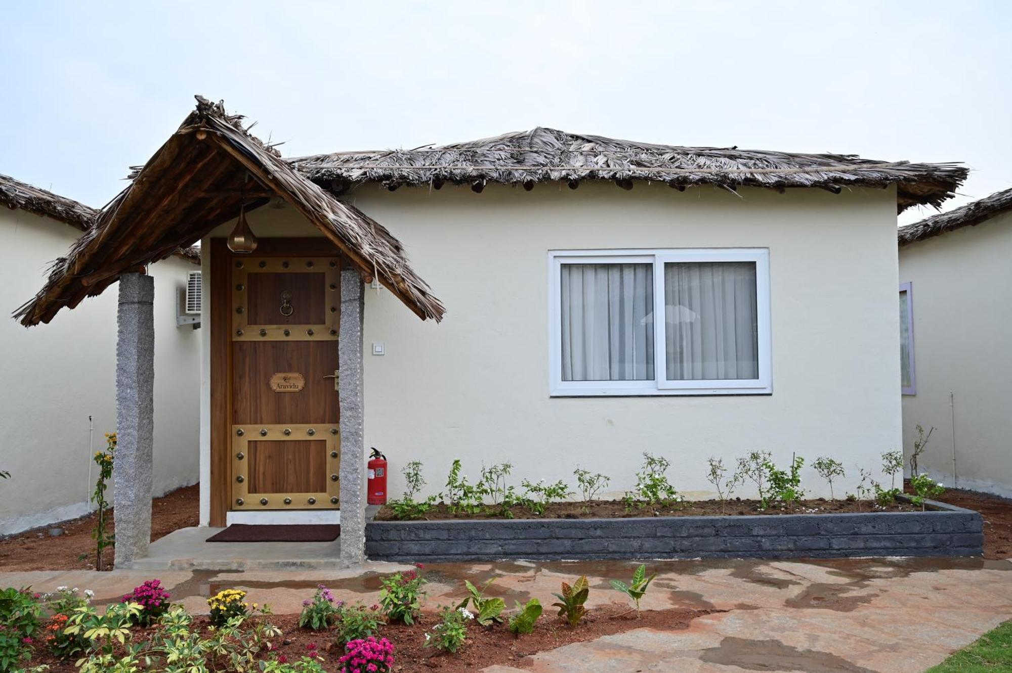 The Hampi Cafe Hotel Exterior photo