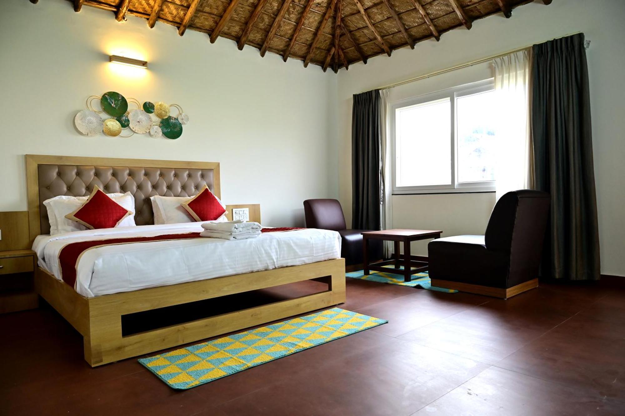 The Hampi Cafe Hotel Exterior photo