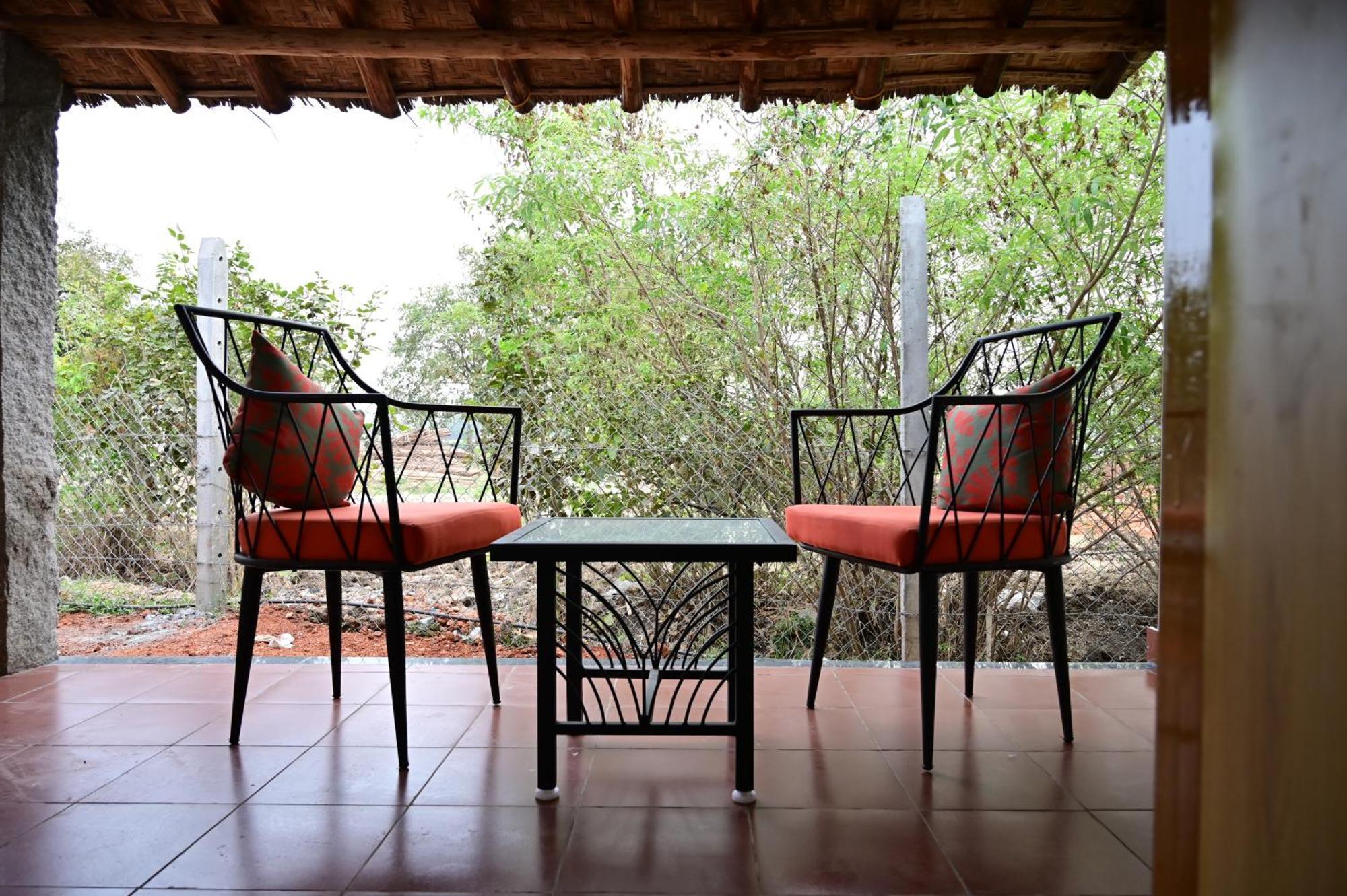 The Hampi Cafe Hotel Exterior photo